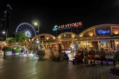 Night market warehouses and promenade at Asiatique The Riverfront